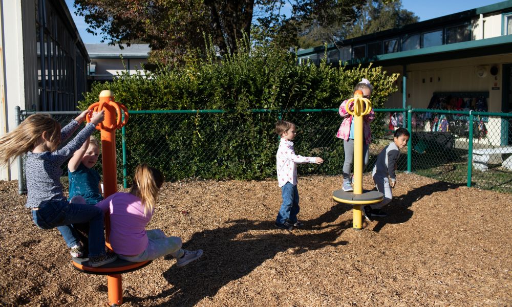 Penngrove students playing on playground equipment.