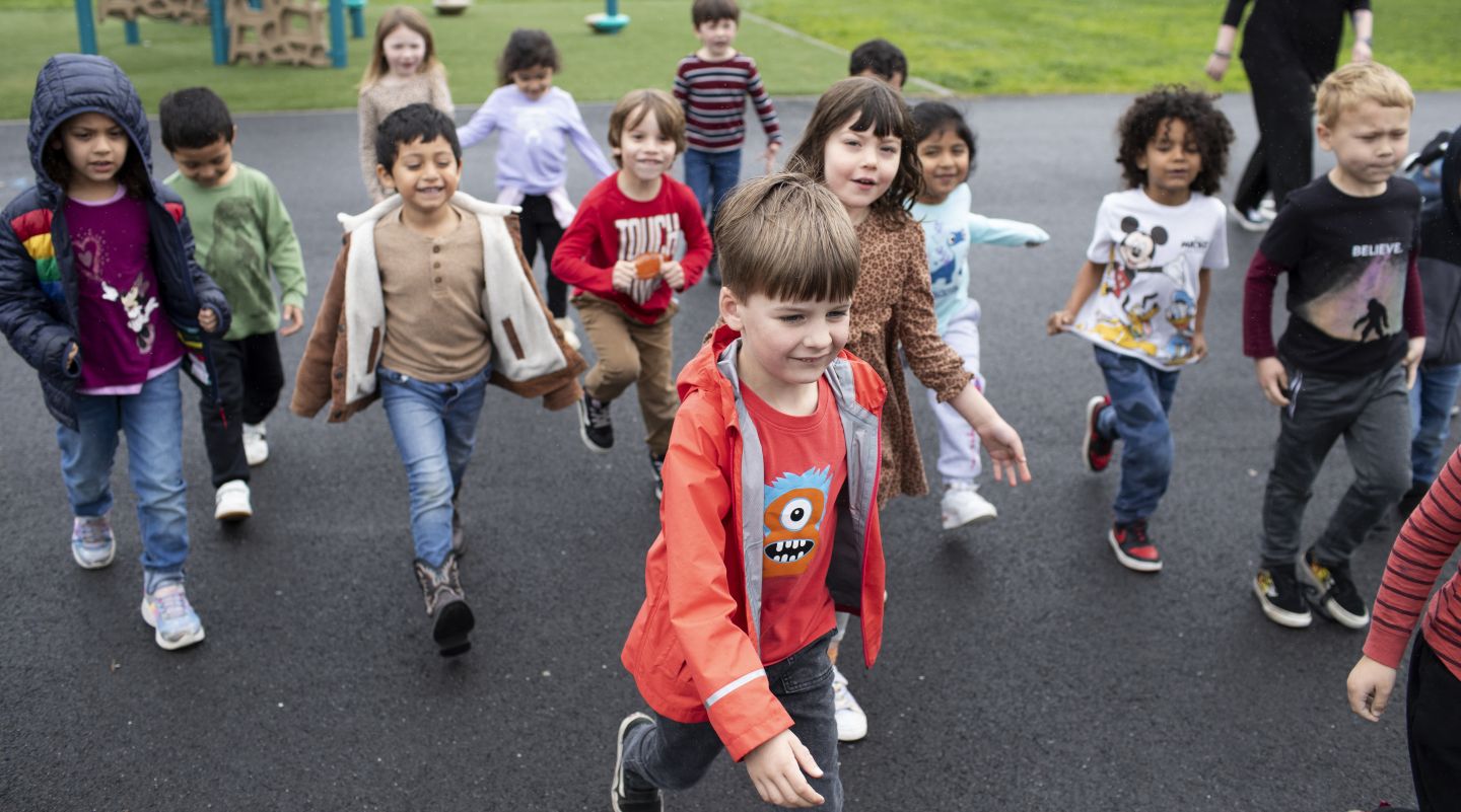 A group of Valley Vista students playing outside on the blacktop